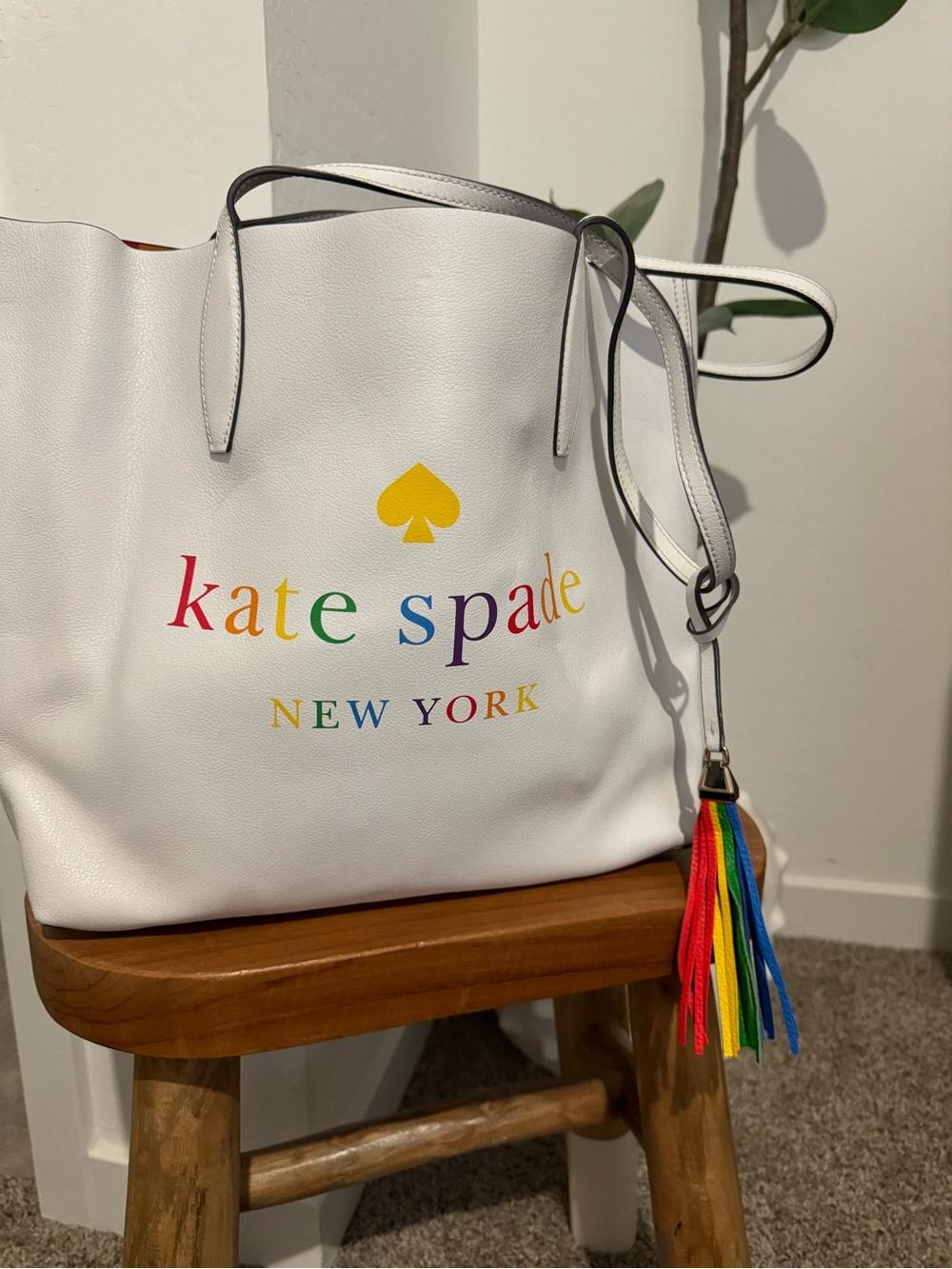 kate spade White Rainbow Logo Tote with Rainbow Tassel Charm